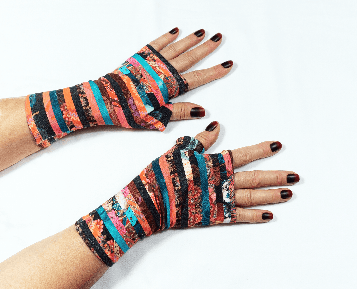 Pulswaermer Handschuhe fingerlos aus French Terry gestreift abstrakt multi