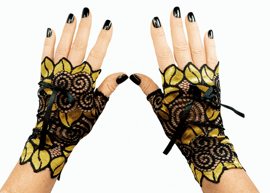auffällige Pulswärmer | Handschuhe fingerlos glänzend mit riesigen Blumen + Schleife in schwarz / gold
