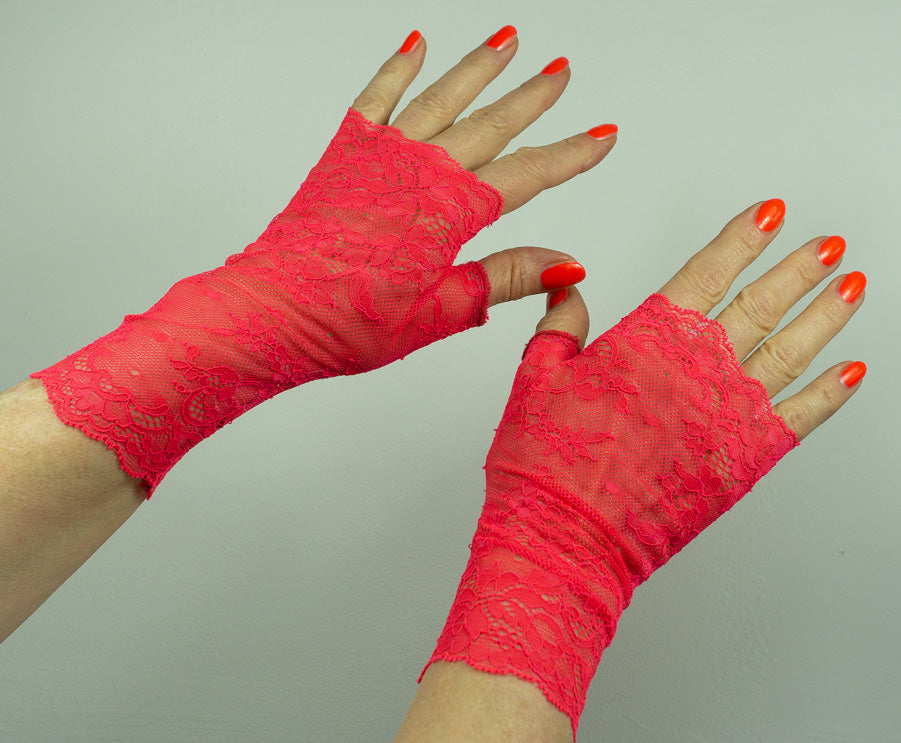 Pulswärmer Handschuhe fingerlos neon pink leuchtend aus Spitze