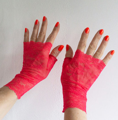 Pulswärmer Handschuhe fingerlos neon pink leuchtend aus Spitze