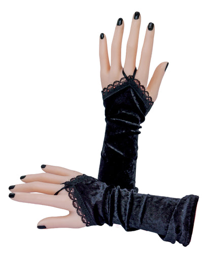 ein Paar leichte, klassische gothic Wichtel-Stulpen in schwarz. An Puppenhänden fotografiert. Eine Stulpe stehend, eine liegend, Nägel schwarz lackiert.
Sie sind anschmiegsam und mit Fingerschlaufe vorne versehen für besseren Halt. Die Stulpen sind ungefüttert und einfach genäht, nach vorne hin wichtelig geschnitten, also spitz zulaufend, rings herum mit Zierspitze verziert. Sie sind nur minimal dehnbar.
