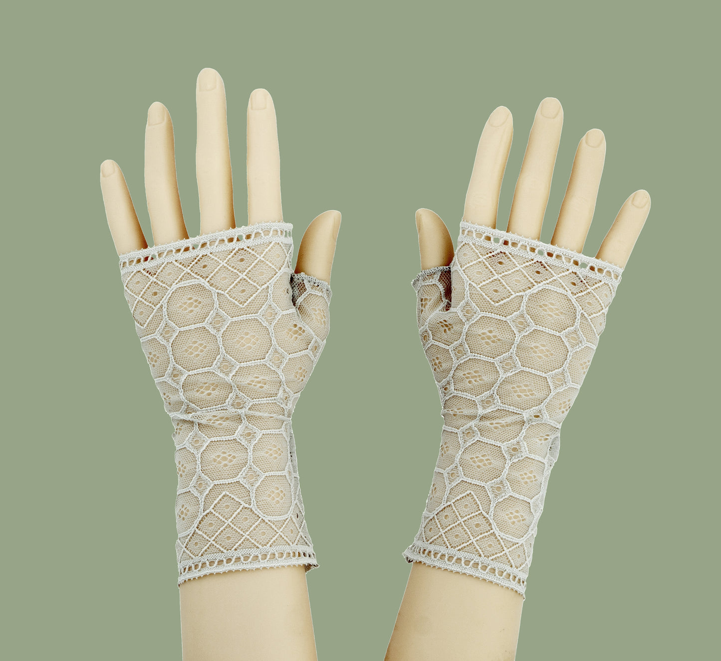 ein paar Handschuhe ohne Finger an einer Puppe fotografiert, Größe wählbar von XS bis XL, elastisch, weiches synthetisches Material, angenehm tragbar