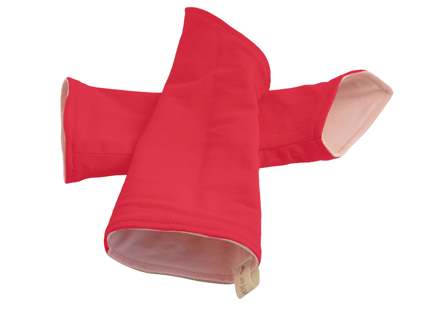 flatlay von einem Paar Wichtel Armstulpen aus Baumwolle zum Wenden, Farbe rosa rot